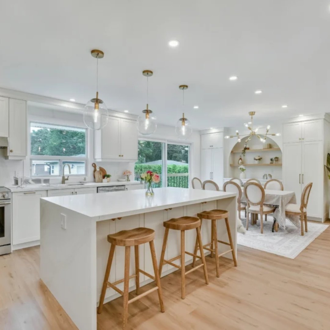 A kitchen with recessed lighting